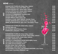 a wine menu with a glass of wine